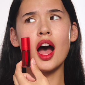 Clarins Water Lip Stain full-lip portrait highlights lasting matte color.