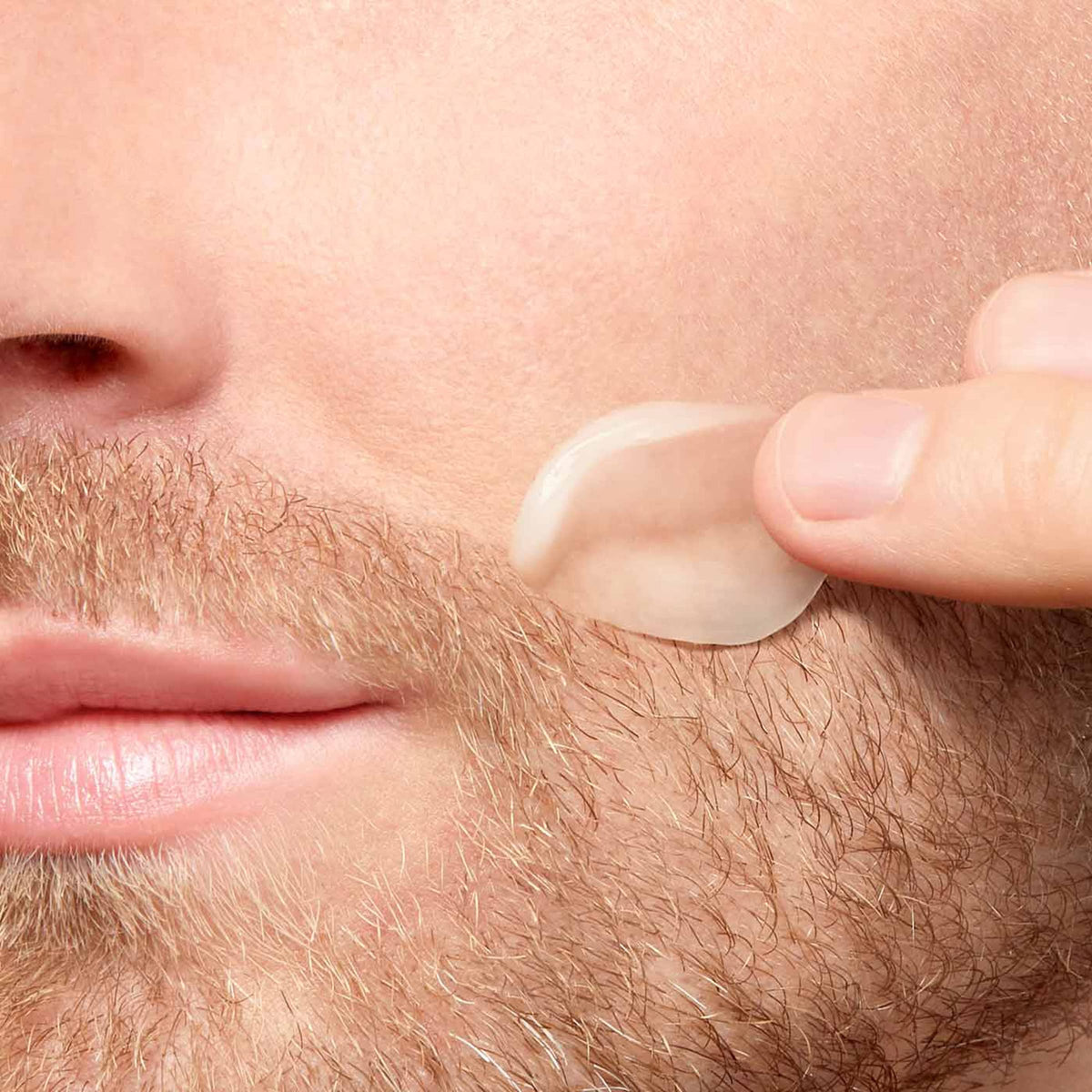ClarinsMen After Shave Gel applied to skin shows calm, refreshed complexion.