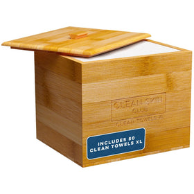 Clean Skin Club Luxe Bamboo container with removable cover on a bathroom counter, keeps towels organized.