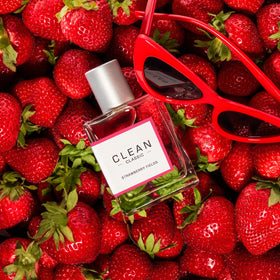 Graphic suggesting layering Clean Strawberry Fields with other scents for customization.
