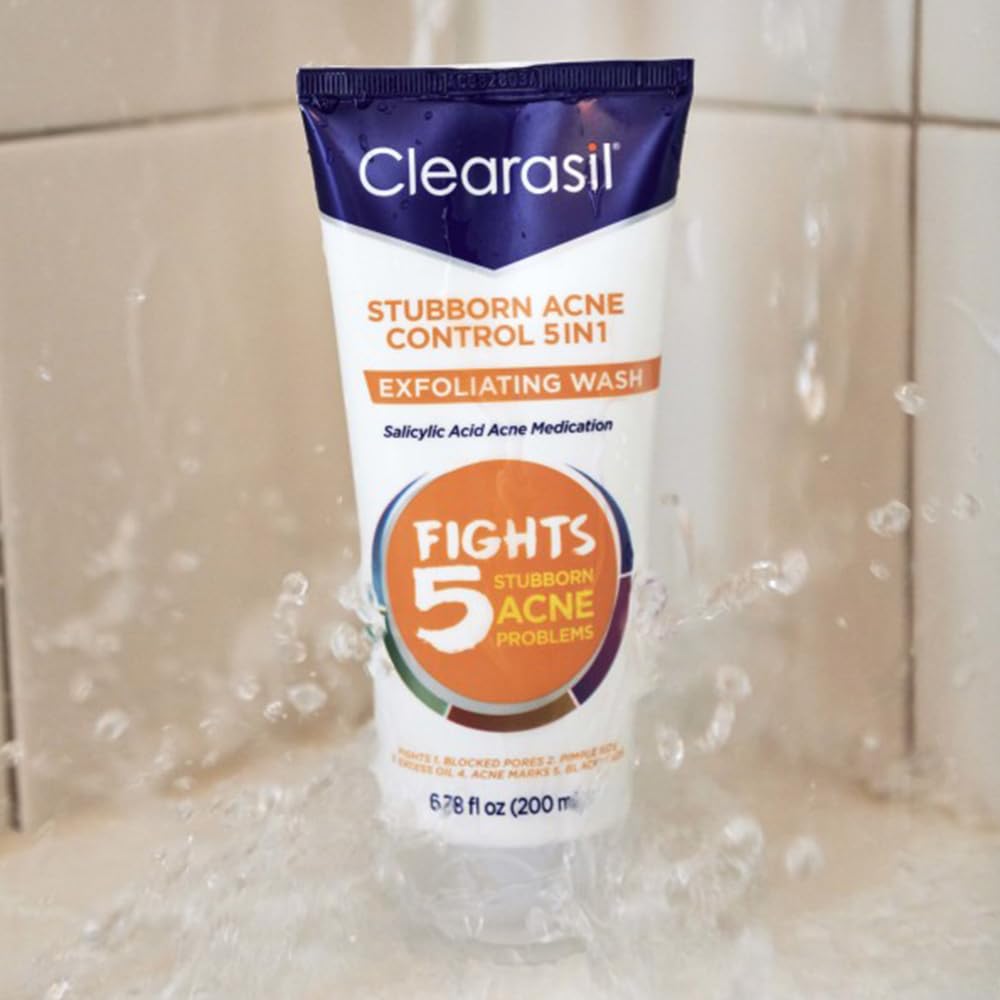 Dermatologist-tested logo badge on Clearasil Stubborn Acne Control packaging