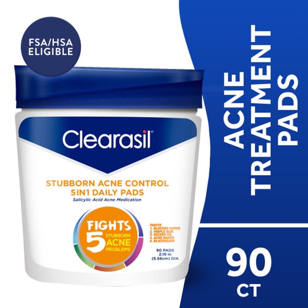 Taking a Clearasil pad from the container for a quick facial cleanse