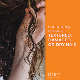 Color-treated hair protected by fragrance-free Cleure leave-in conditioner.