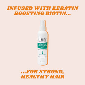 Damp hair with Cleure leave-in conditioner for detangling and frizz control.