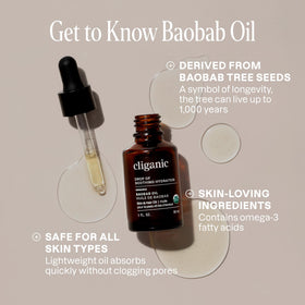 Cliganic Baobab Oil dropper pour demonstrates precise application for face and hair.