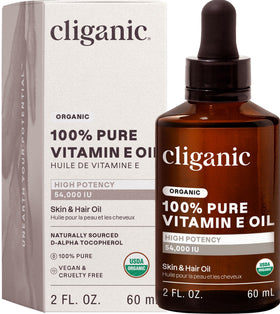 Cliganic Organic Vitamin E oil bottle for facial skin nourishment.