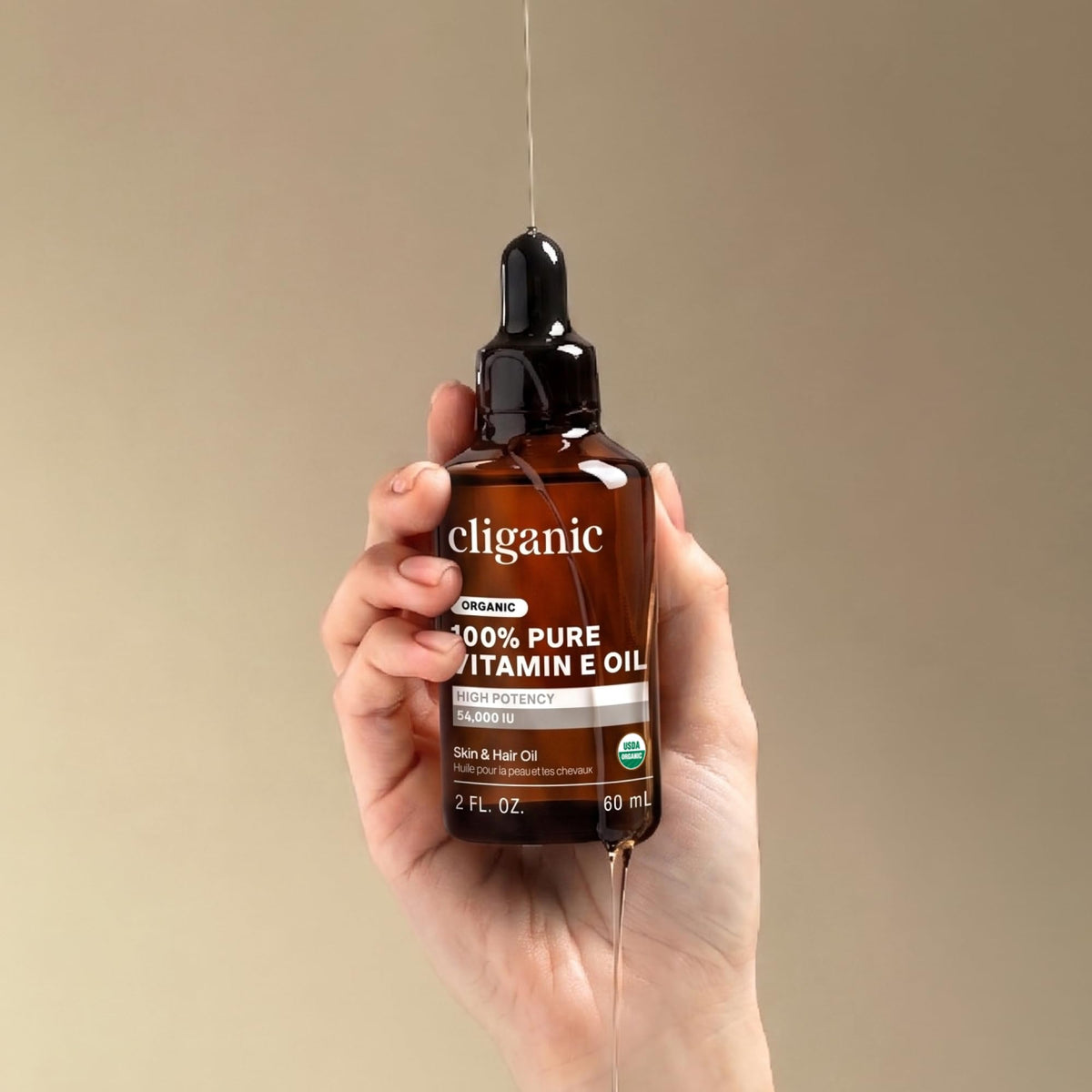 Cliganic Vitamin E oil displayed with organic skincare products for a simple routine.