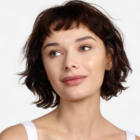 Clinique Beyond Perfecting packaging highlights product claims and durability.