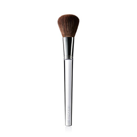 Clinique Blush Brush apple-cheeks for precise, buildable color on the cheeks.