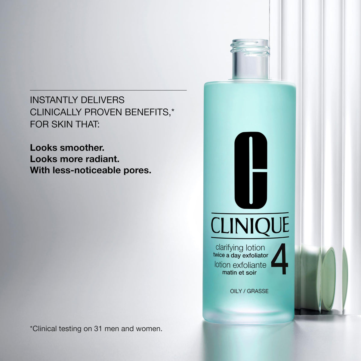 Clinique Clarifying Lotion 4 cotton ball application for gentle exfoliation
