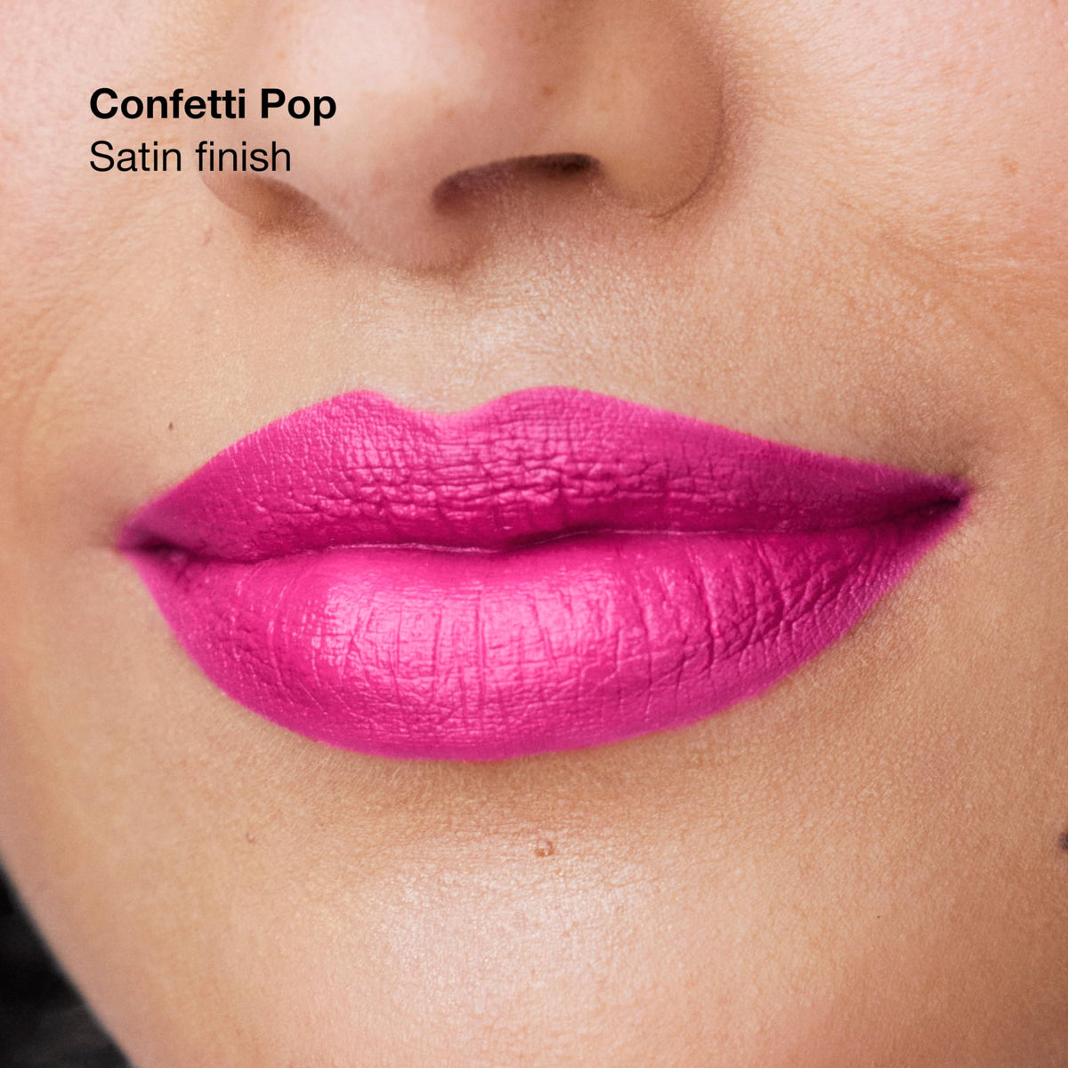 Clinique Pop Longwear Lipstick being applied for smooth coverage