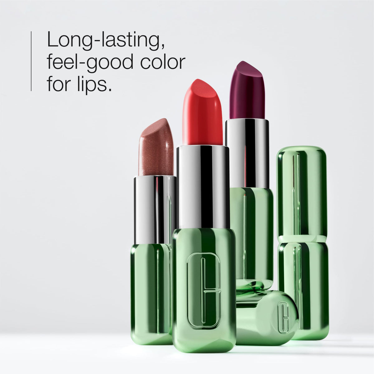 Clinique Pop Longwear Lipstick swatches on arm reveal shade range and depth.