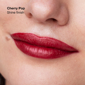 Clinique Pop Longwear lipstick packaging highlights sleek, travel-friendly design.