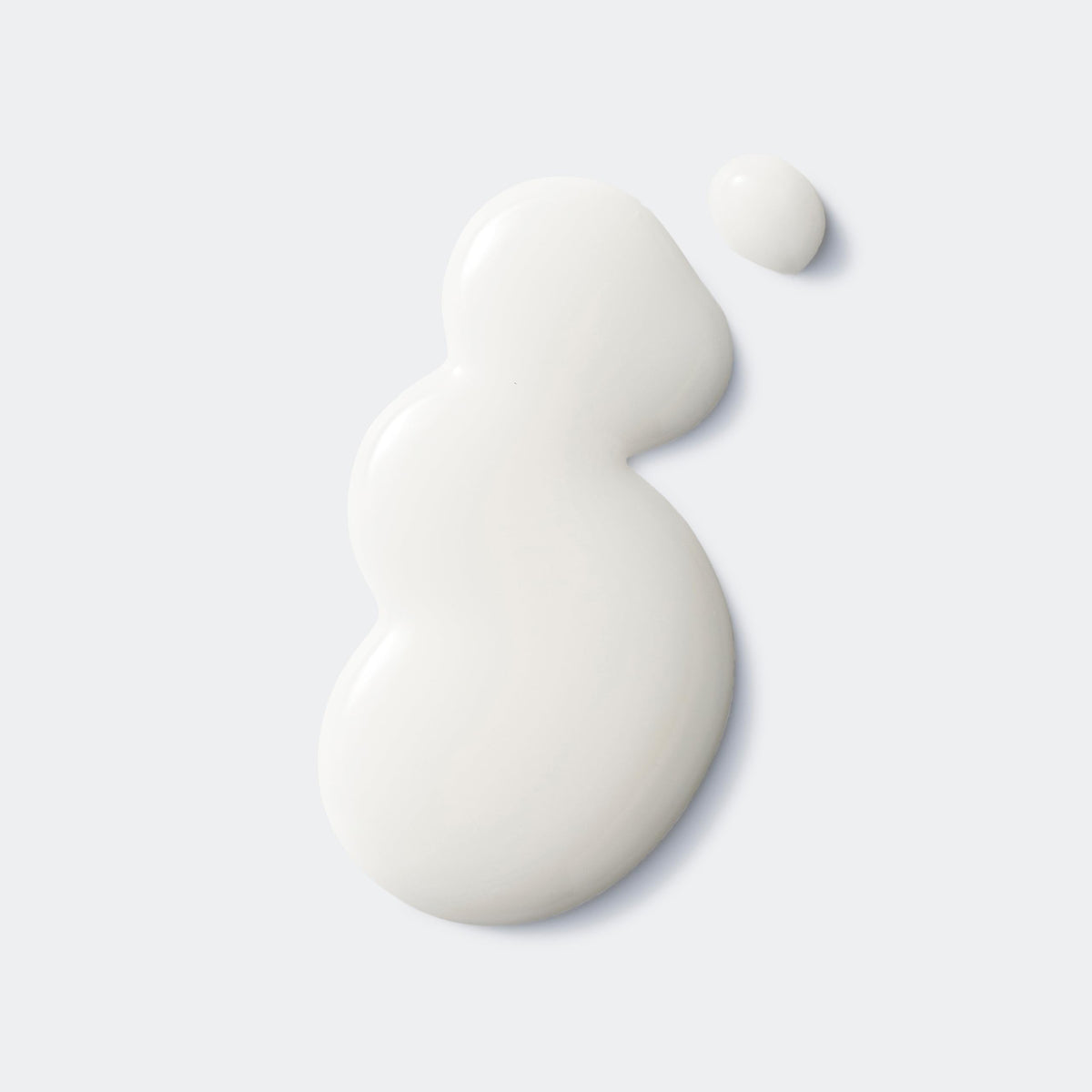 Swatch of Clinique Turnaround silky serum texture suggesting smooth skin.