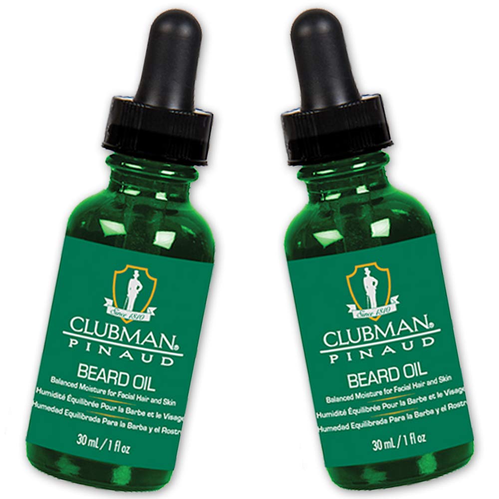 Clubman Pinaud beard oil bottle promoting natural shine and grooming.