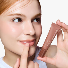 CNP Propolis Jelly Lipcerin on lips with glossy caramel shine.