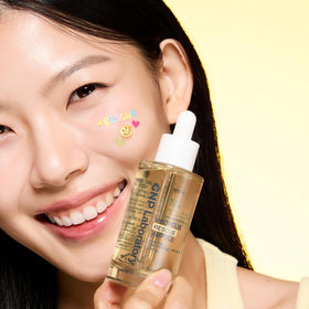 CNP Rescue+Propolis Serum texture swirled on skin shows lightweight hydration.