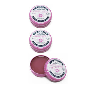 C.O. Bigelow Sakura Rose Salve tins on vanity, compact hydration for lips and skin.