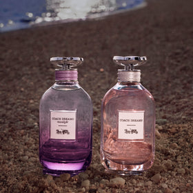 Coach Dreams Moonlight bottle on the wrist for a refined vibe