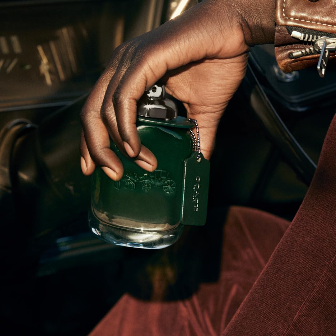 Coach Green Cedarwood dry-down conveys masculine woody balance
