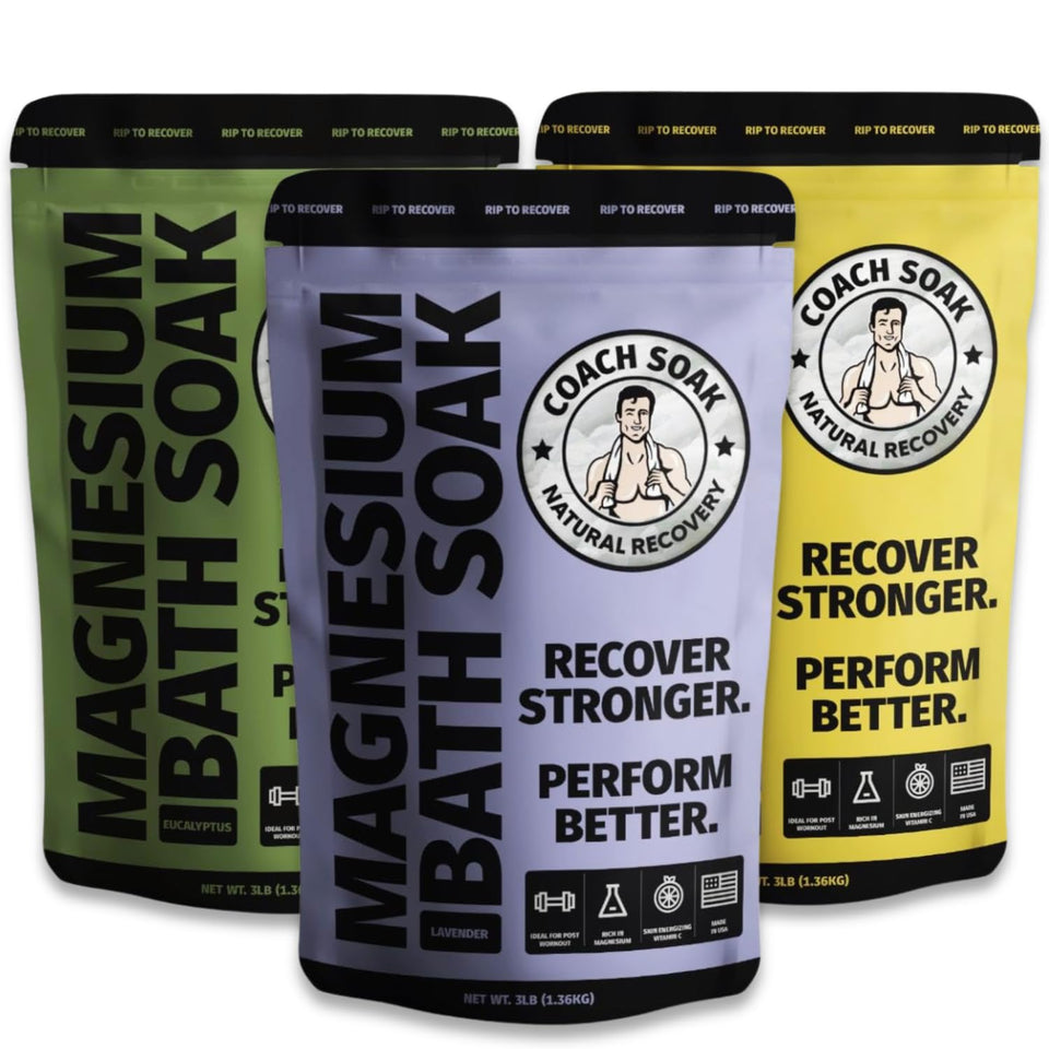 Coach Soak Recovery bottle pours into water for a soothing bath