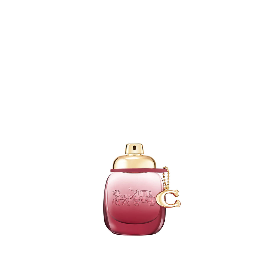 Coach Wild Rose bottle with ombre gradient suggesting bold, feminine allure for daily wear.