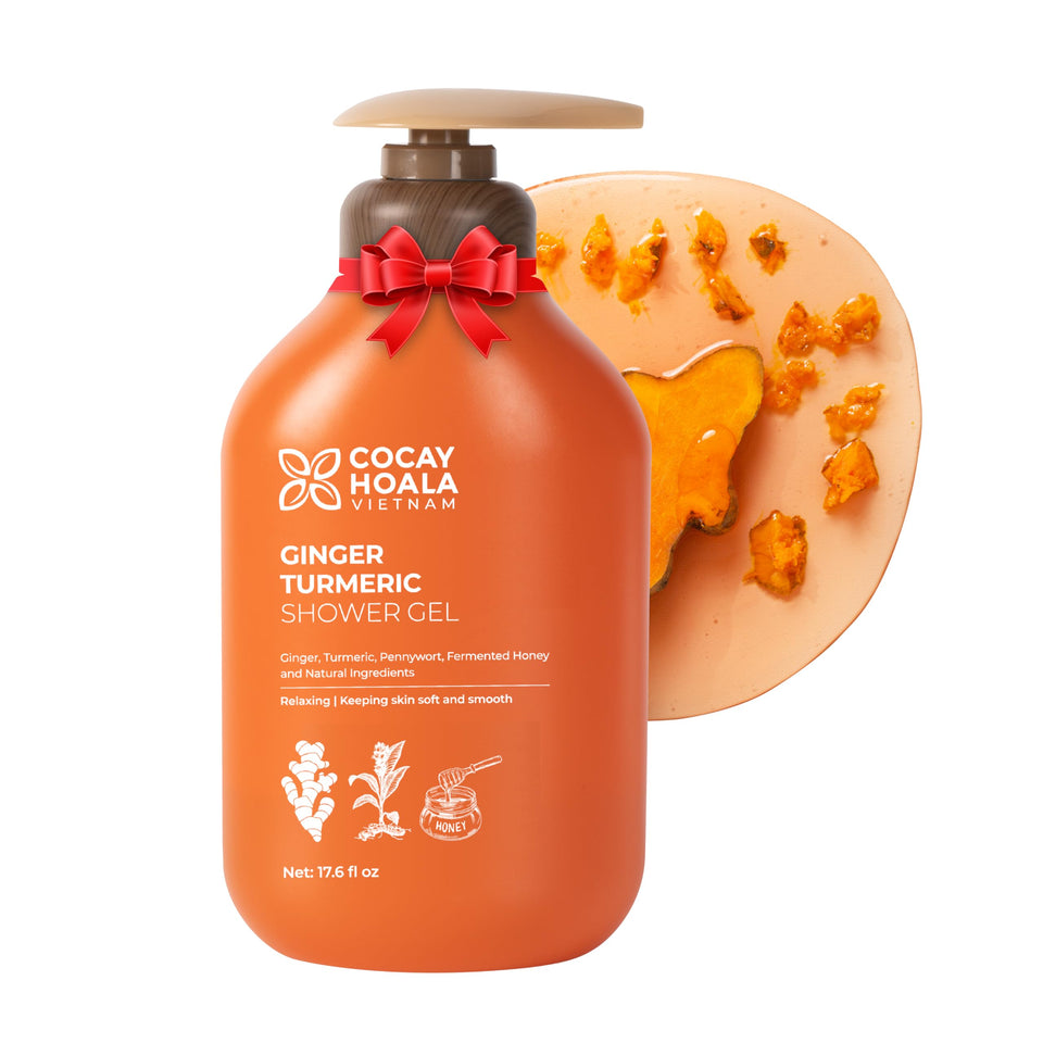 COCAY HOALA VIETNAM turmeric exfoliating body wash bottle pouring for daily gentle cleansing.