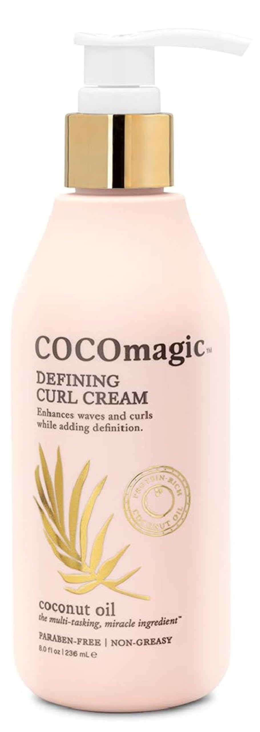 Cocomagic Defining Curl Cream bottle highlights hydration for softer, defined curls with reduced frizz