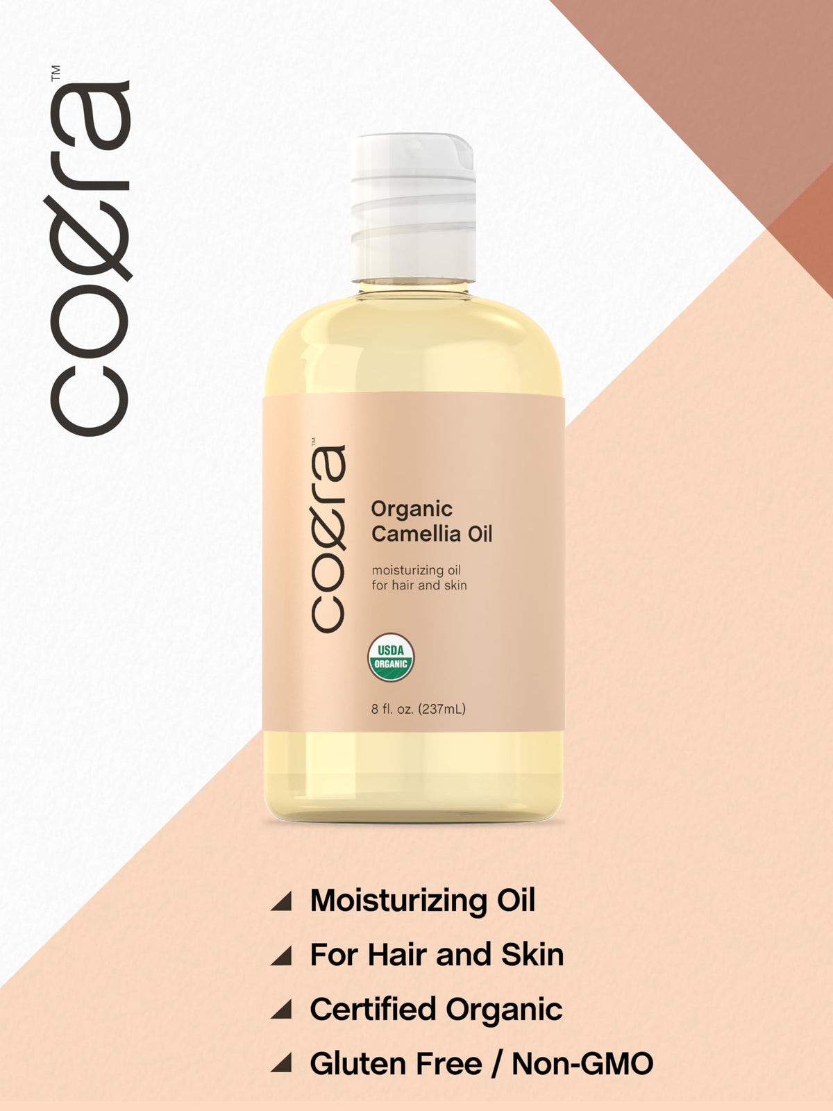 Coera Camellia Seed Oil applied to a hair strand for smooth shine.