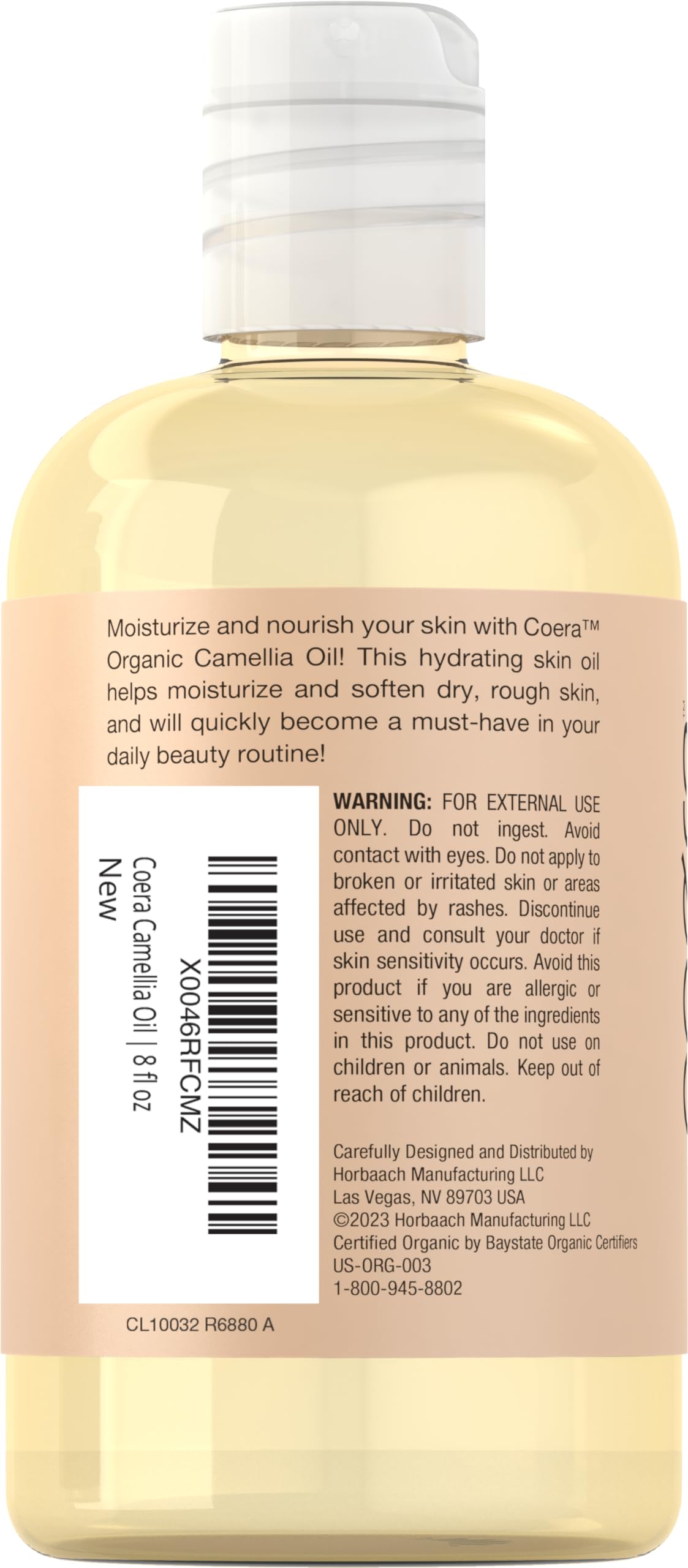 Coera Camellia Seed Oil label close-up shows organic non-GMO notes.