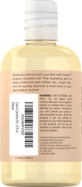 Coera Camellia Seed Oil label close-up shows organic non-GMO notes.