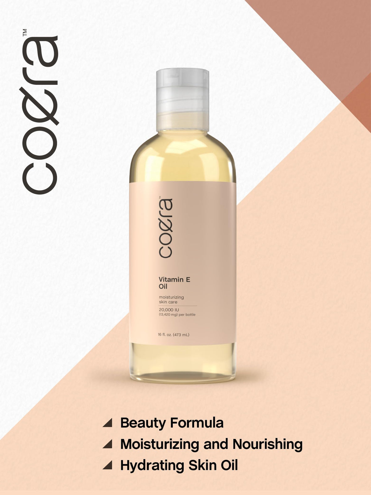Coera Vitamin E Oil label closeup confirms fragrance- and paraben-free formula.