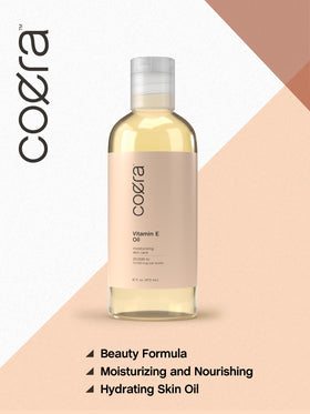 Coera Vitamin E Oil label closeup confirms fragrance- and paraben-free formula.