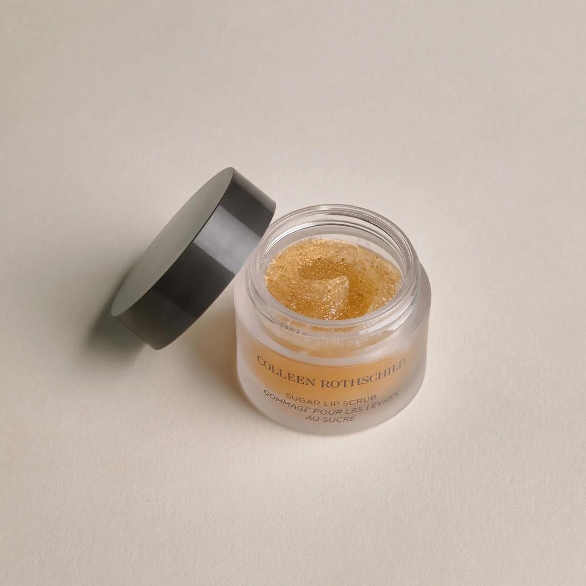 Colleen Rothschild Sugar Lip Scrub sensory experience with warm brown sugar scent.
