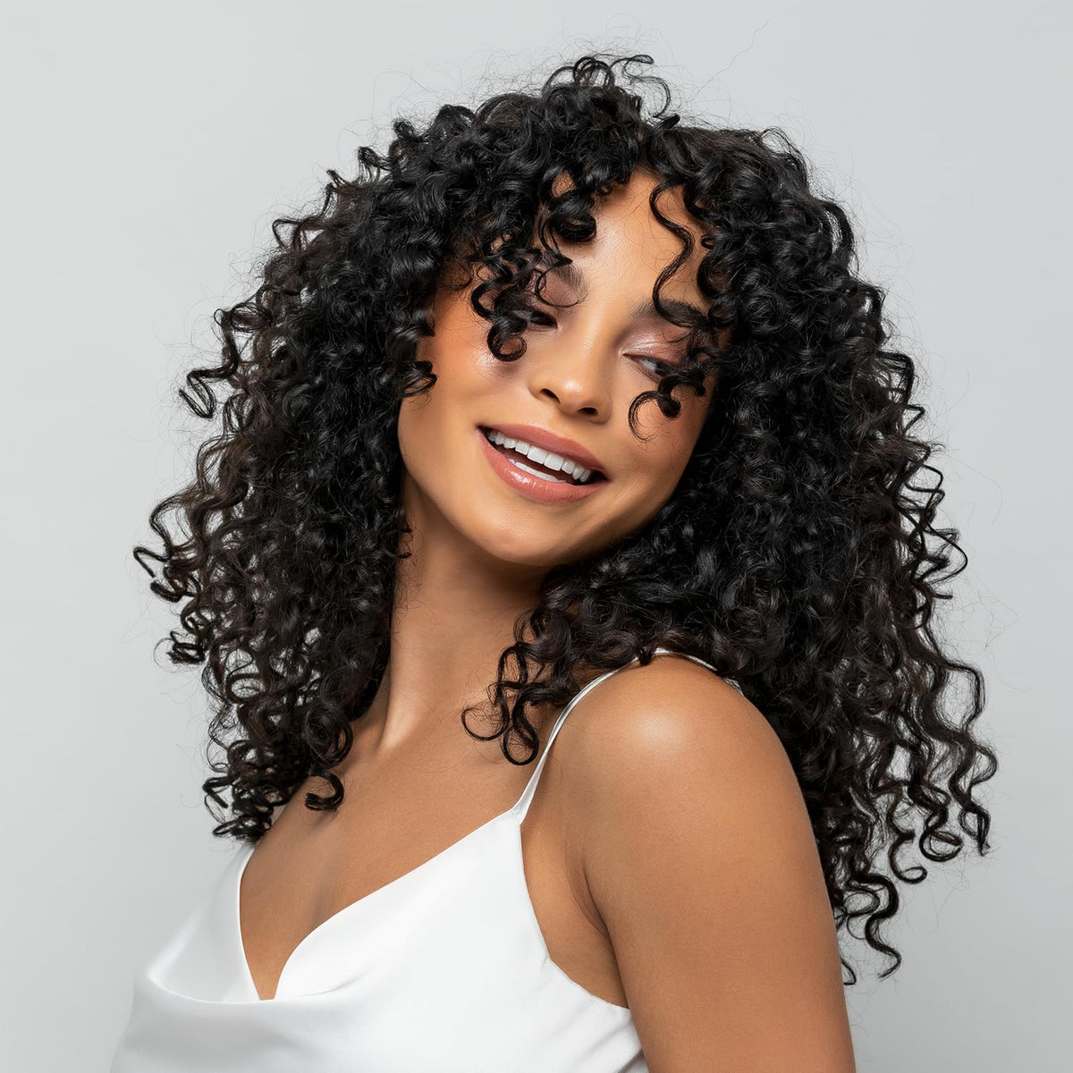 Color Edge Glazed Curl Defining Styler application rake shows detangling and defined curls.