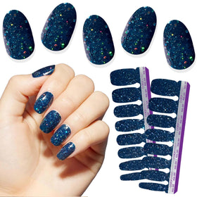 Color Street Oceans Apart navy glitter strips for a quick, smudge-free at-home manicure.