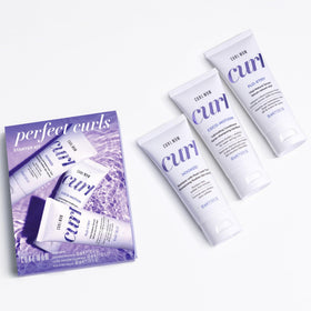 COLOR WOW Curl Wow Hooked Shampoo bottle boosts roots and curls for refreshed volume.