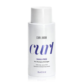 COLOR WOW Curl Wow Snag-Free Pre-Shampoo Detangler bottle pour showing slip before washing