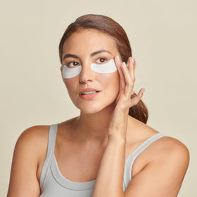 Colorescience Total Eye Hydrogel Masks being applied for cooling, depuffing eye care.