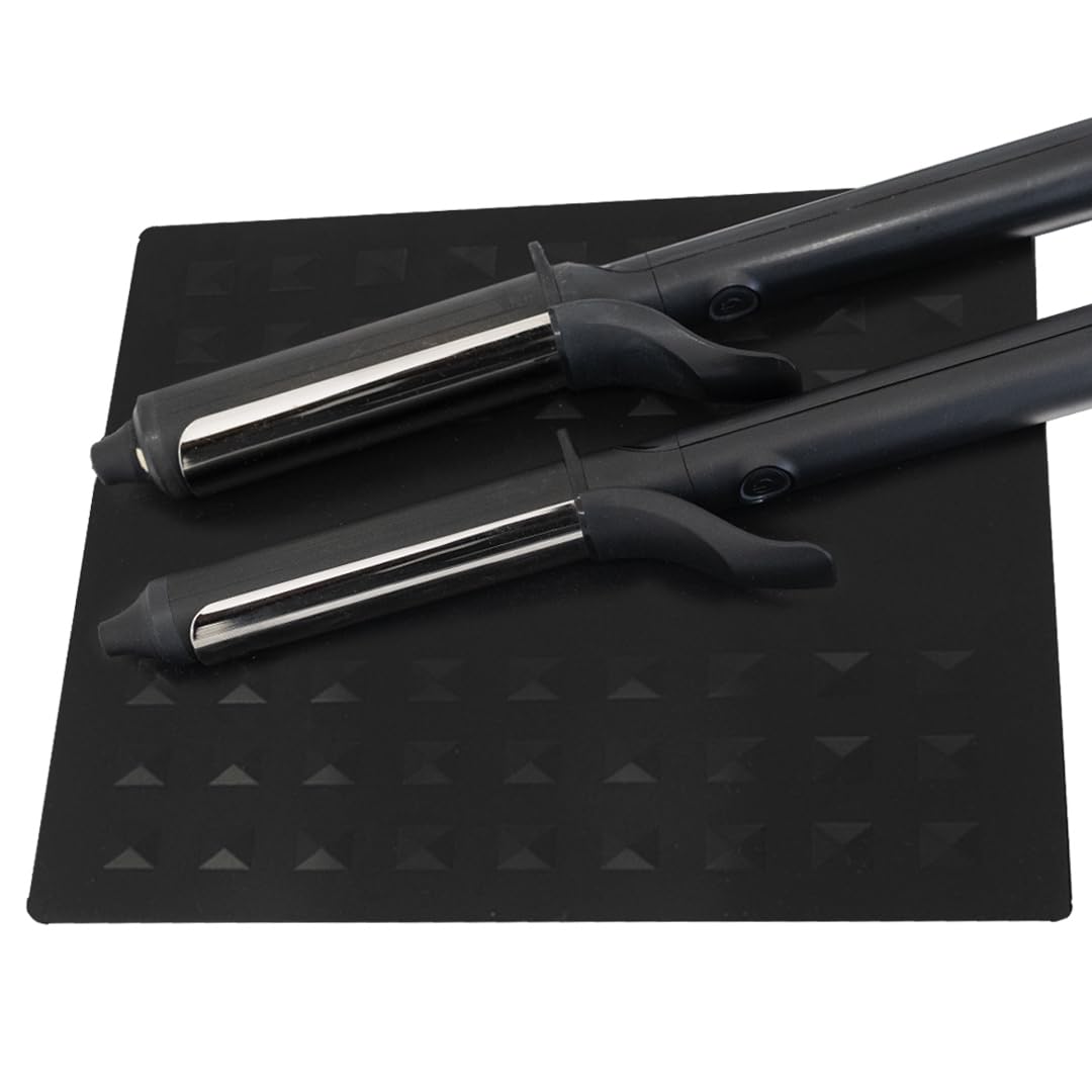 Colortrak heat-resistant styling station mat shown protecting a workstation from hot tools