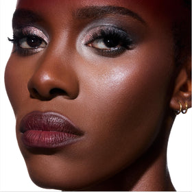 Side-by-side application of ColourPop Twilight Eclipse highlighter with finger for full coverage