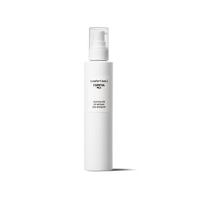 Comfort Zone Essential Cleansing Milk bottle closeup showing silky texture for makeup removal.