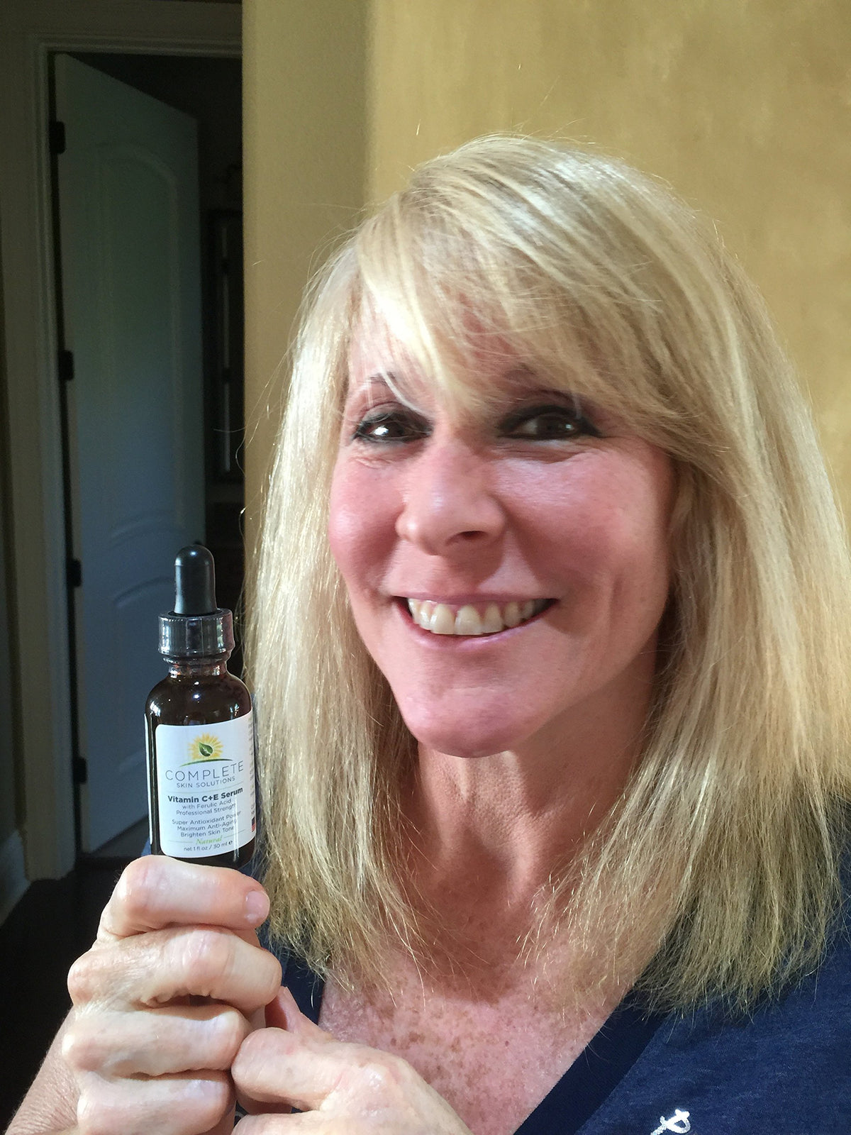 Complete Skin Solutions packaging with glass bottle and premium finish.