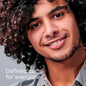 Conair Curl Define Pro on long, tight curls for defined, bouncy definition.