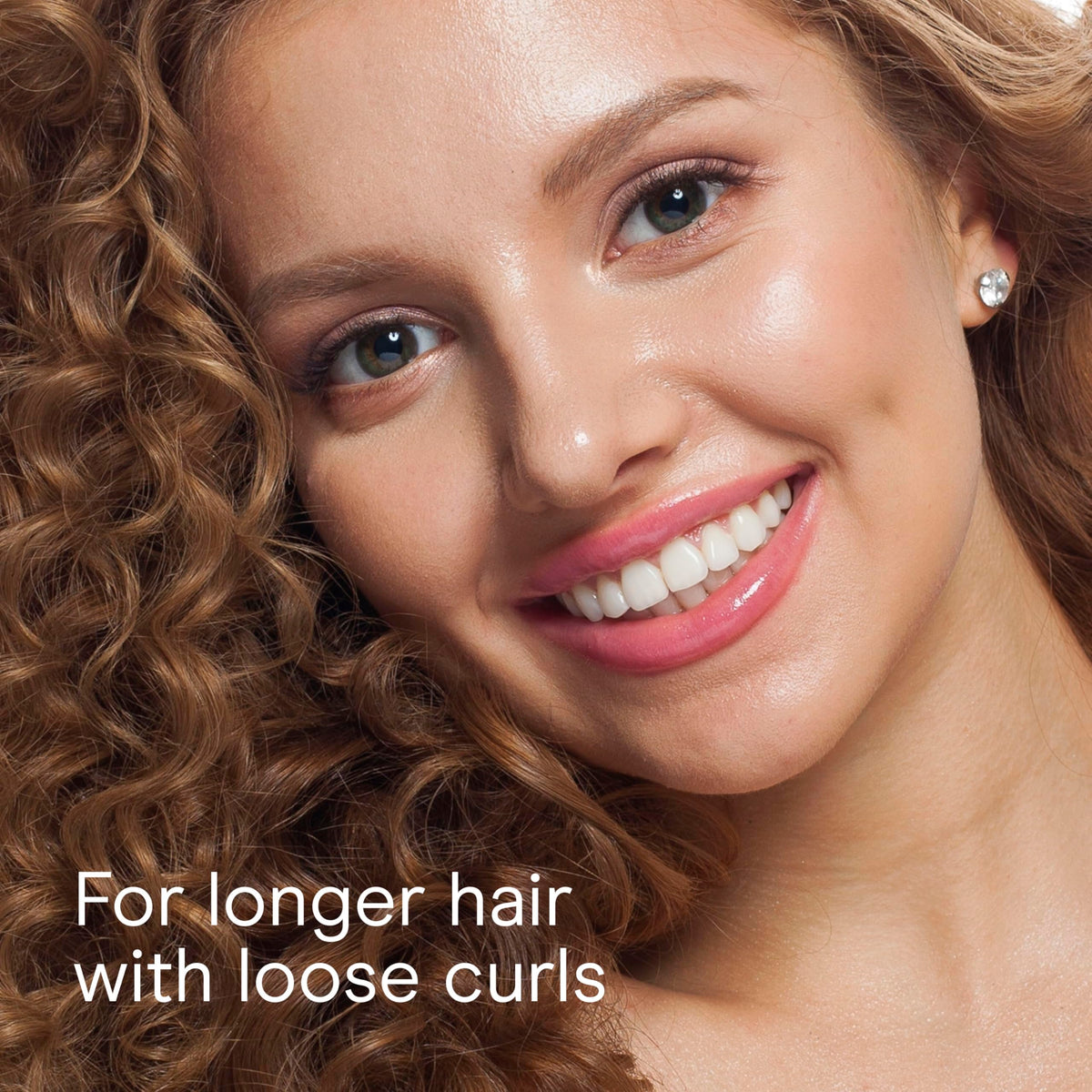 Conair Curl Define Pro detangler brush with included sectioning clips for easy parting.
