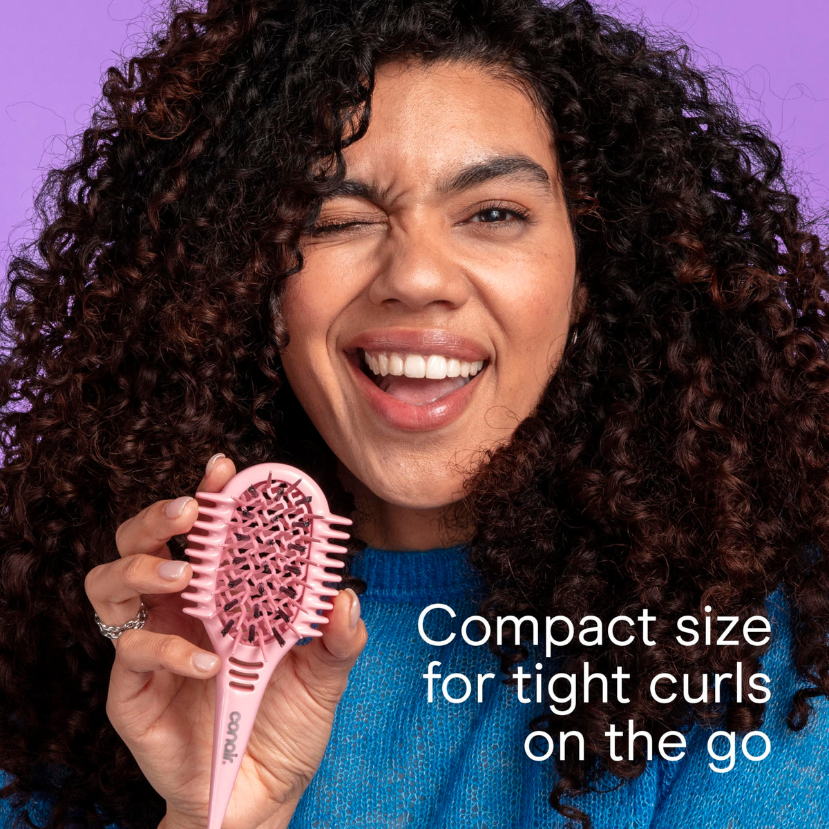 Conair Curl Define Pro helps prep curls on wet hair for quick touch-ups.