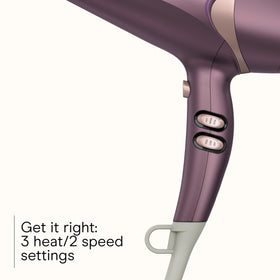 Purple Infiniti Pro dryer highlights a powerful 1875W motor for fast drying.