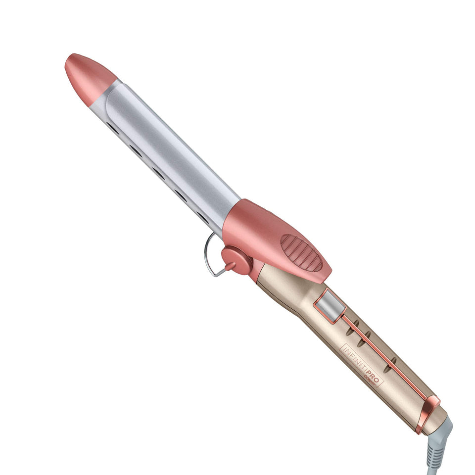 Conair INFINITIPRO Frizz Free curling iron close-up shows titanium ceramic barrel for smooth, glossy curls.