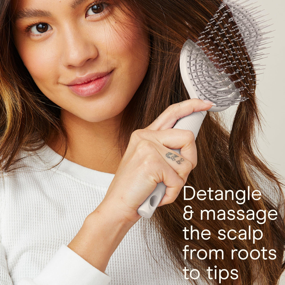 Conair Scalp Care Midsize Slim Cushion Brush fits in a bag for on-the-go styling