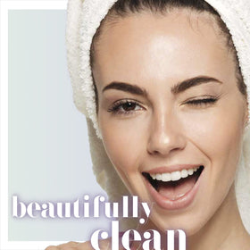 Conair True Glow device releasing hydrating mist to soften skin during routine.